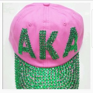 One new AKA bling hat. 1 AKA charms